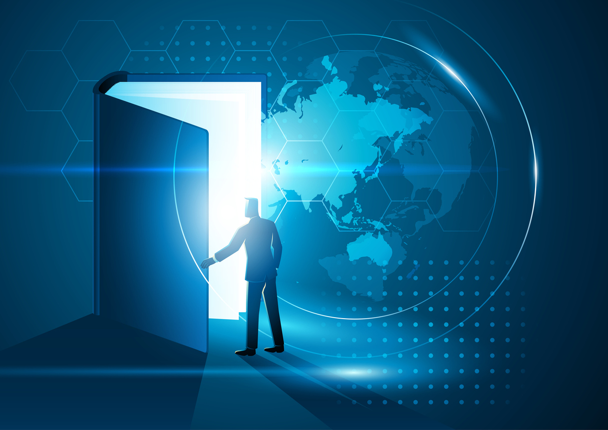 A person opens a giant book as we demystify technical translation.